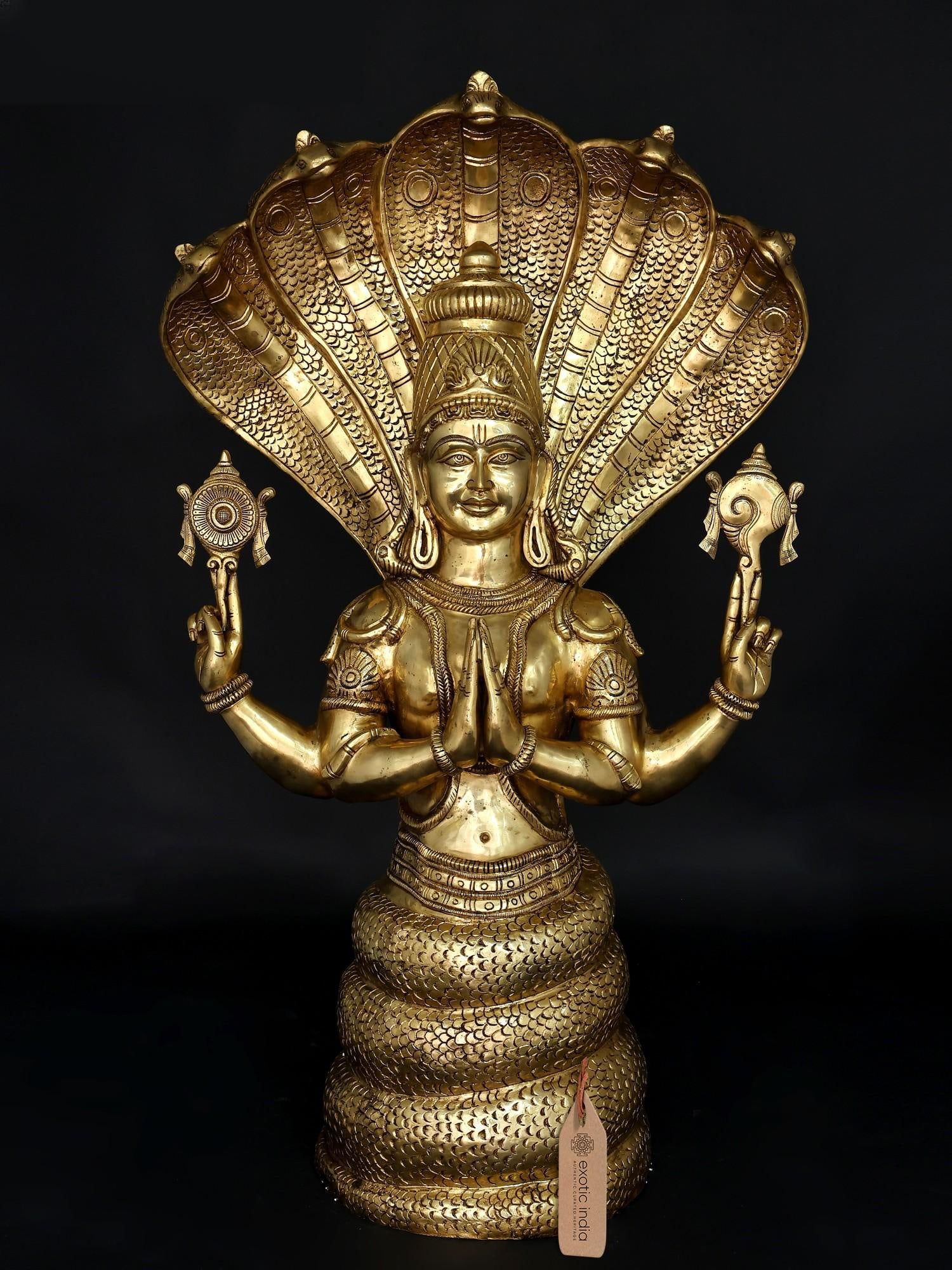 52" Large Idol of Divine Patanjali with Sheshnag – Symbol of Yoga, Knowledge & Serenity |: Embodiment of Cosmic Serenity and Knowledge This magnificent brass sculpture depicts a divine figure seated upon a coiled serpent, a powerful symbol of cosmic energy, protection, and divine consciousn
