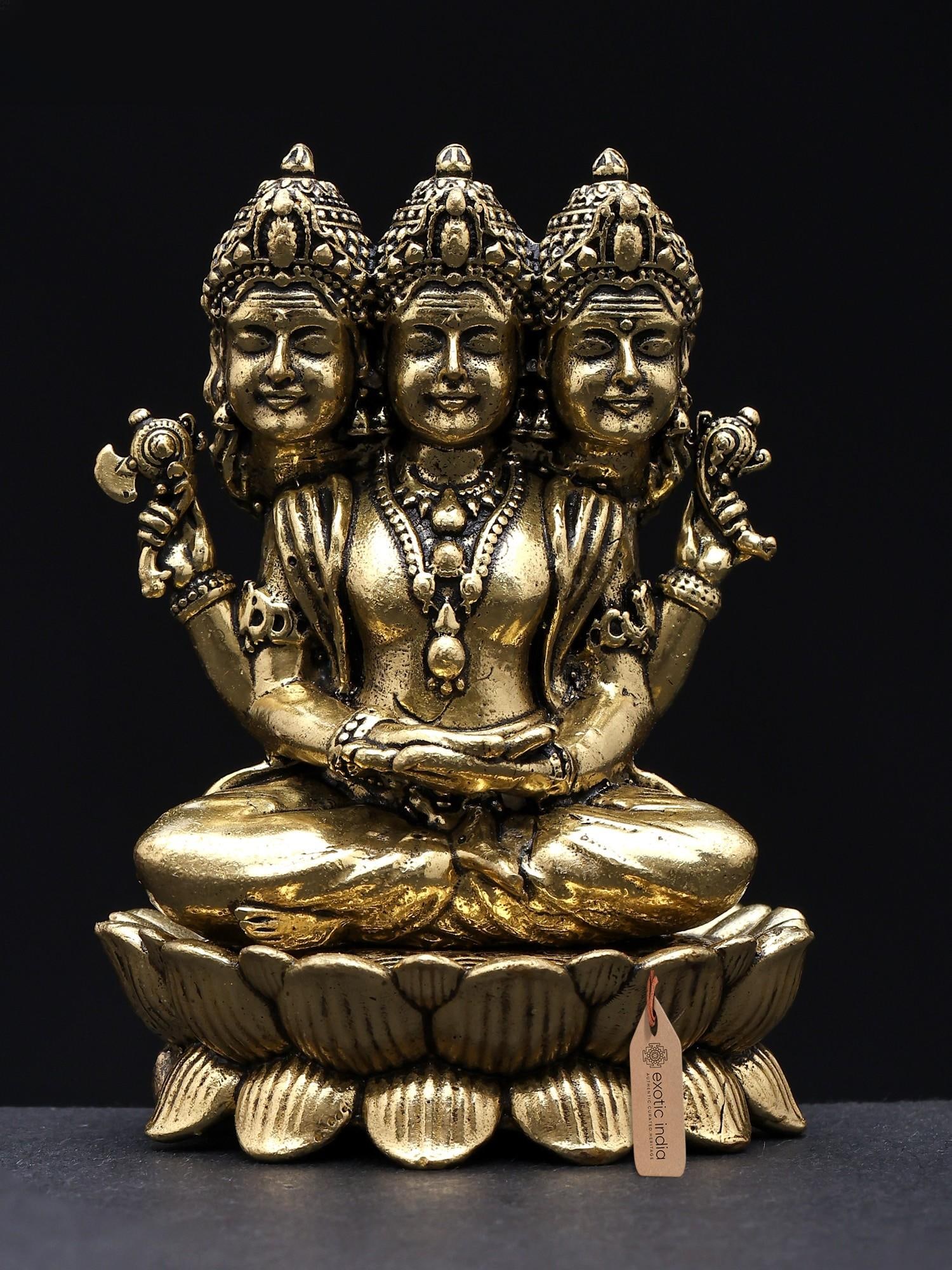 3" Small Sacred Dattatreya: Embodiment of Brahma, Vishnu, and Shiva | Superfine Brass Statue: The Divine Trinity Embodied This exquisite brass statue captures the serene and powerful presence of Dattatreya, a divine figure revered in Hinduism as the embodiment of the Trimurti – Brahma,