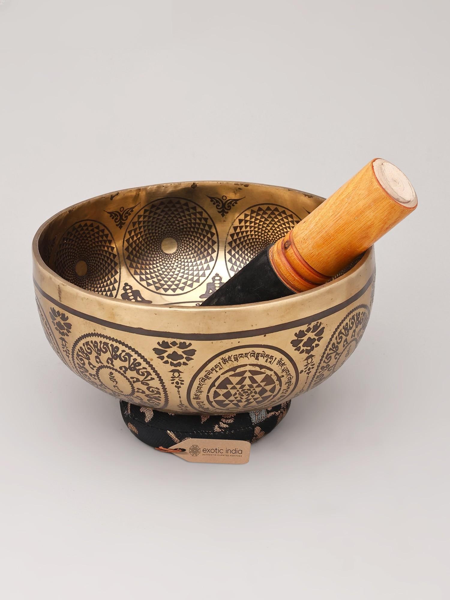 8" Buddhist Bronze Singing Bowl with Auspicious Symbols | Handmade | Made in India: The Resonance of Ancient Wisdom Immerse yourself in the profound sonic traditions of Buddhism with this exquisite 8-inch bronze singing bowl. Crafted by skilled artisans in India, this bowl is more
