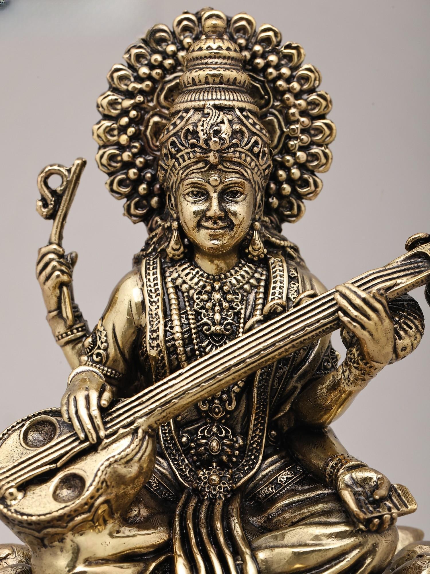 Superfine Seated Four Armed Goddess Saraswati with Wood Base | Brass Idol - 2