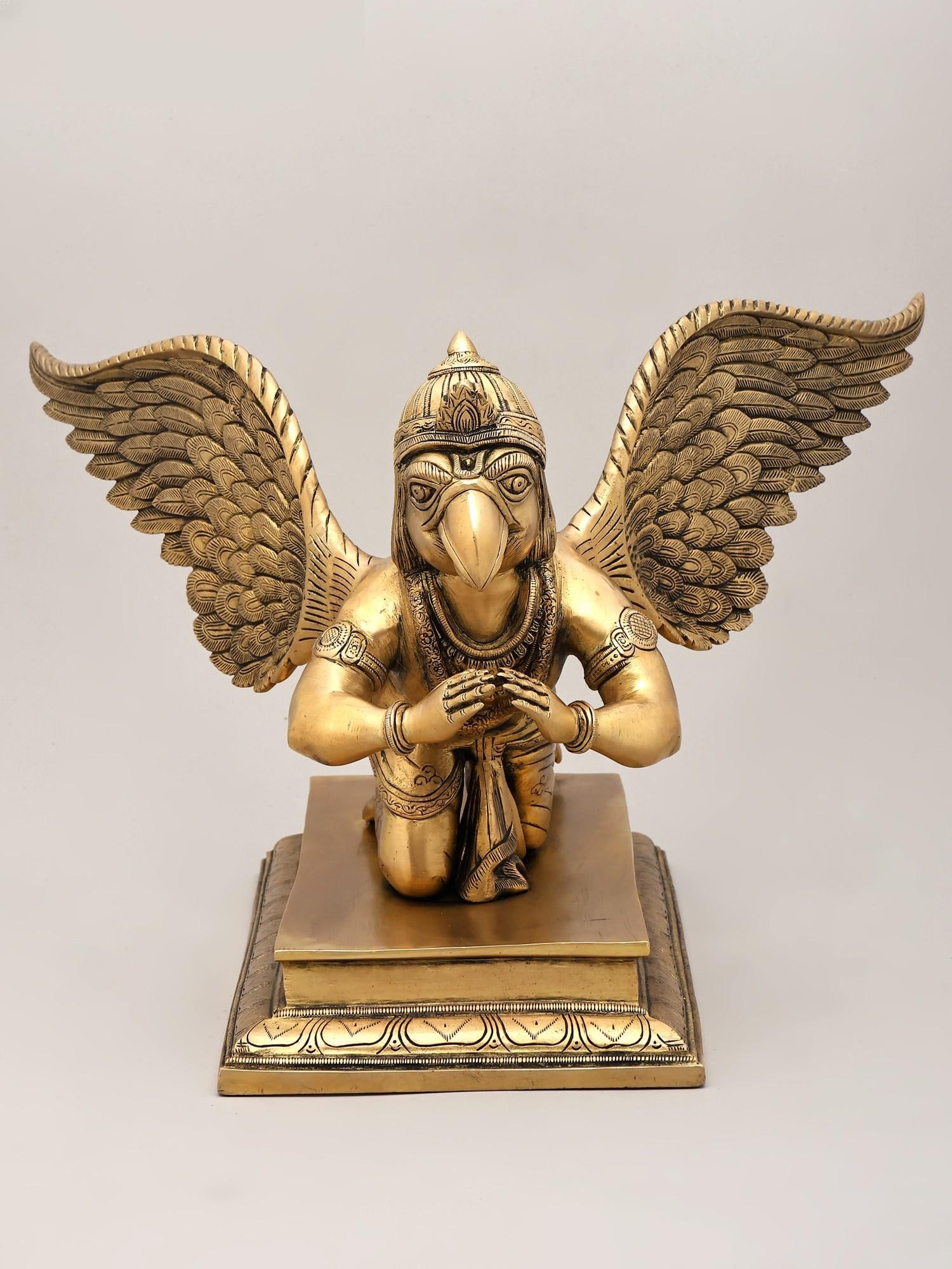 16" Garuda Dev - Vahana of Lord Vishnu | Brass Statue: Embodiment of Devotion: A Majestic Garuda Statue This exquisite brass statue captures the divine essence of Garuda, the celestial eagle and the revered vahana (mount) of Lord Vishnu. Crafted with meti