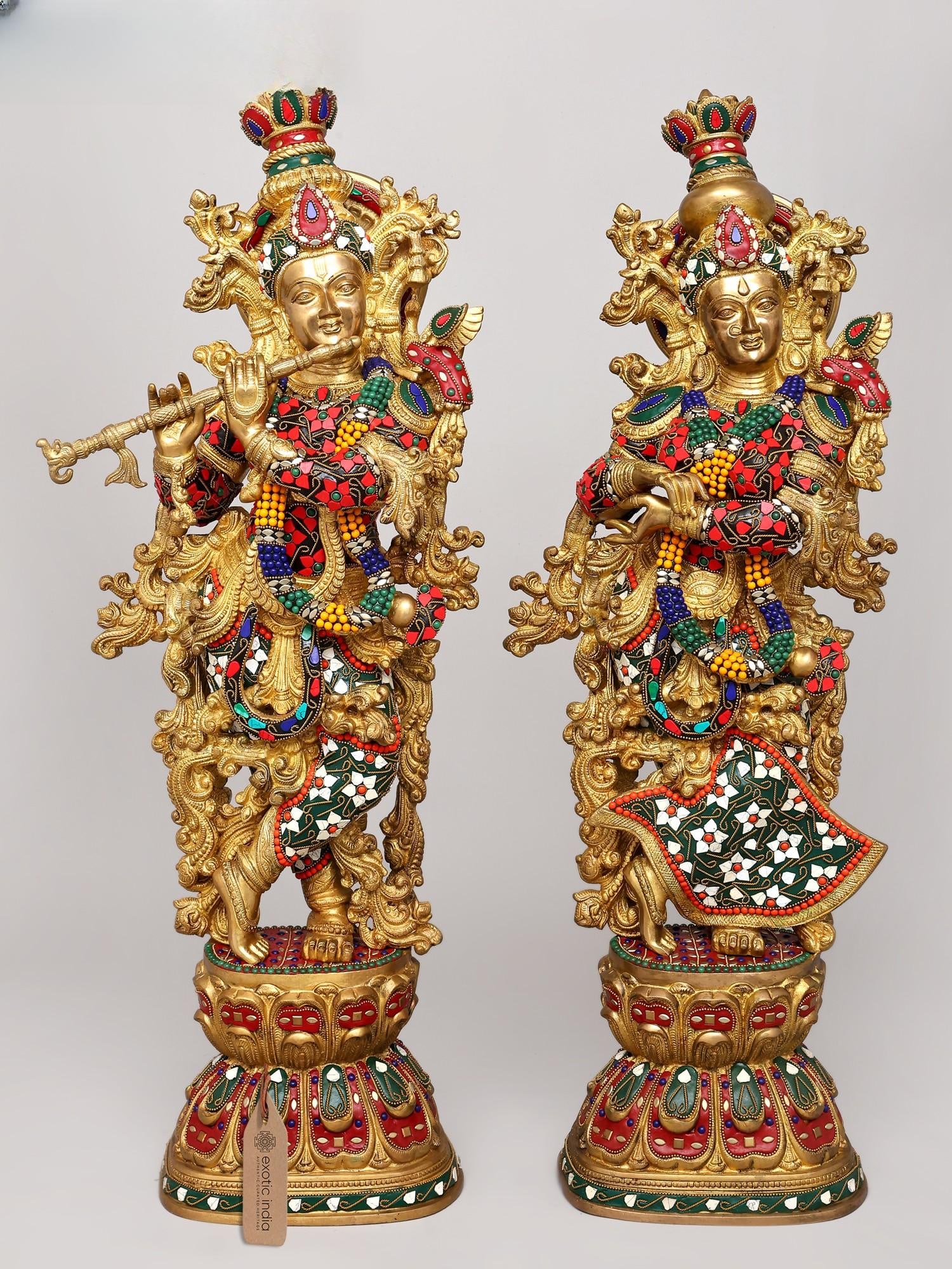 29" Radha and Krishna Standing on Lotus | Brass Statue | Handmade | Made in India: Divine Union and Celestial Melody This exquisite brass statue captures the enchanting presence of Radha and Krishna, two of the most revered figures in Hindu mythology. Standing gracefully on a bloomi