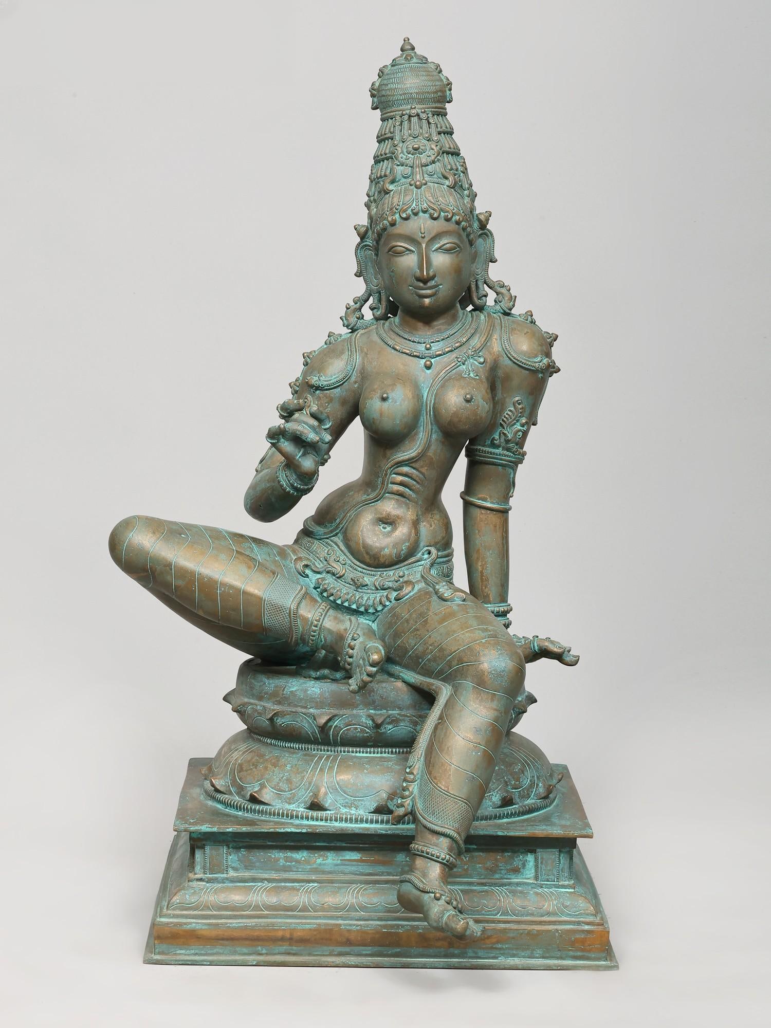 32" Large Superfine Goddess Uma (Parvati) Seated on Lotus Pedestal | Bronze Statue: The Divine Grace of Goddess Uma Immerse your space in the serene and powerful presence of Goddess Uma, also known as Parvati, the consort of Lord Shiva and mother of the universe. This magnificent bro