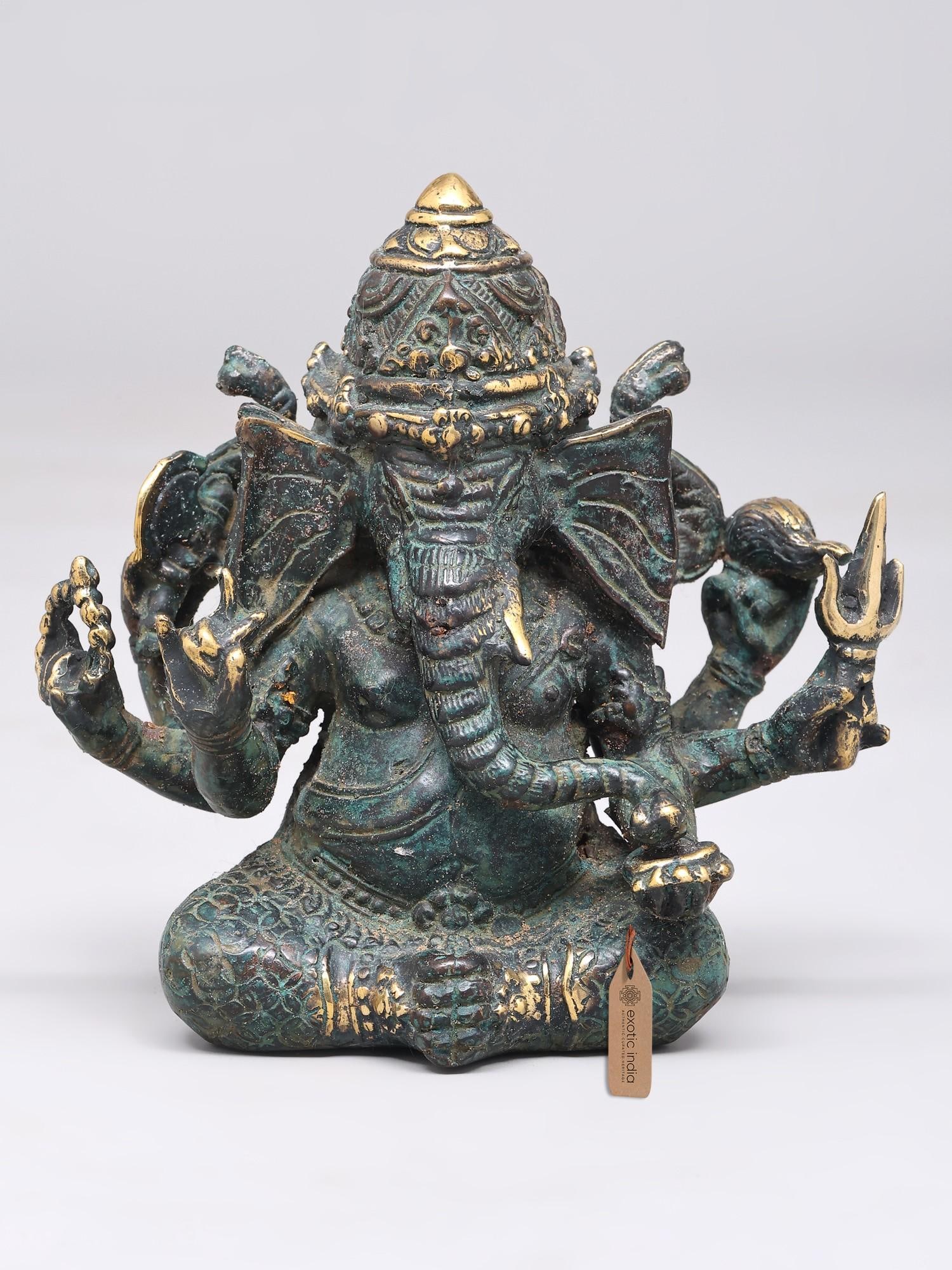 5" Small Three Headed Six Armed Lord Ganesha | Brass Statue: The Multifaceted Lord of Beginnings This exquisite brass statue captures the divine form of Lord Ganesha, the beloved elephant-headed deity revered as the remover of obstacles and the god of wisdom,