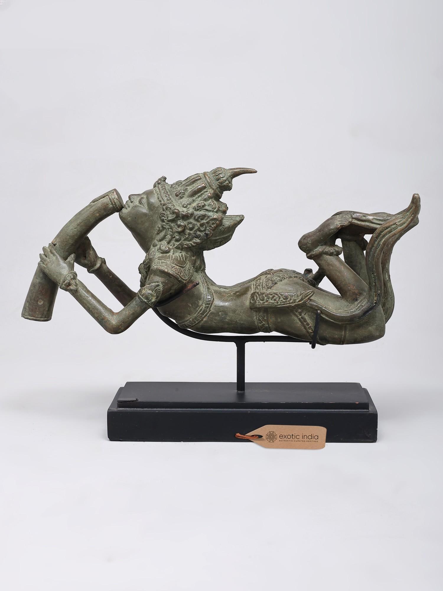13" Opium Drinker | Brass Statue on Wood Base | Handmade: 13" Opium Drinker | Brass Statue on Wood Base | Handmade Reserve: $305.00 Shipping: Domestic: Shipping rates are determined by destination International: Foreign shipping rates are determined by