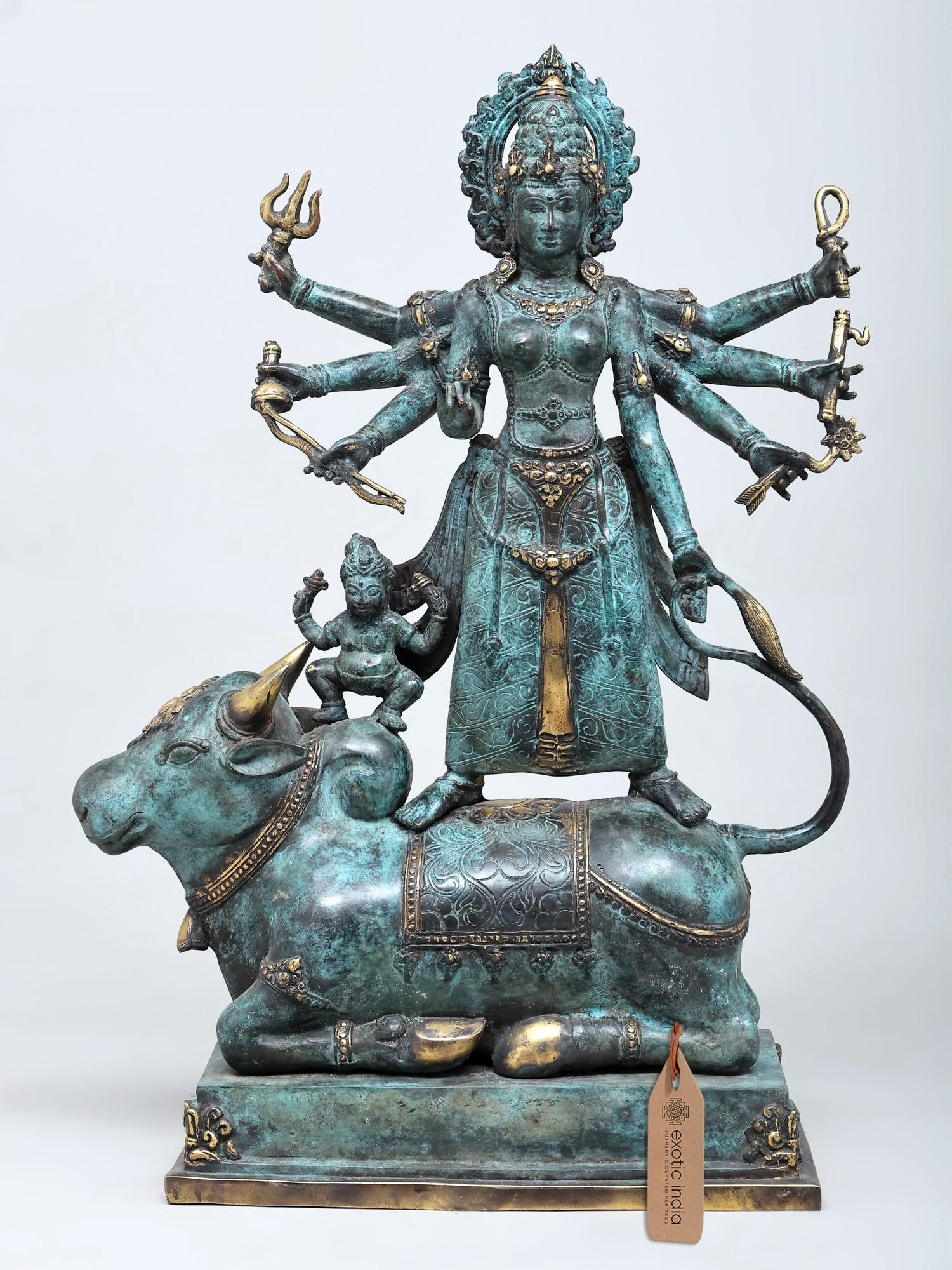 22" Goddess Parvati Transforming into Goddess Durga | Brass Statue: The Divine Transformation: From Parvati to Durga This magnificent brass statue captures a pivotal moment in Hindu mythology: the divine transformation of Goddess Parvati into the formidable Goddess Du