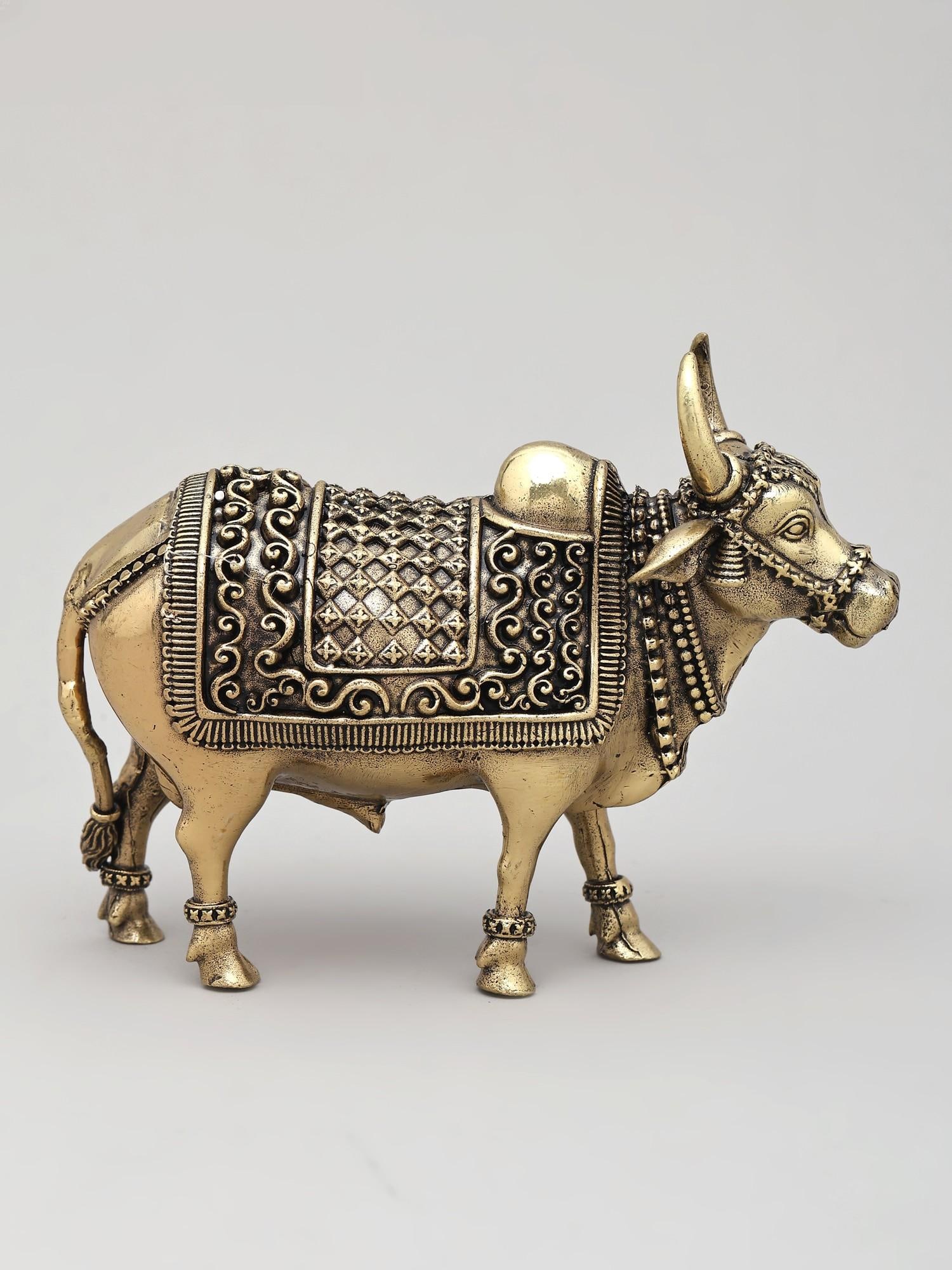 5" Small Superfine Standing Nandi | Brass Statue: The Steadfast Guardian: A Brass Nandi Sculpture This exquisite brass sculpture captures the revered form of Nandi, the bull who serves as the vahana (vehicle) and gatekeeper of Lord Shiva. In Hindu