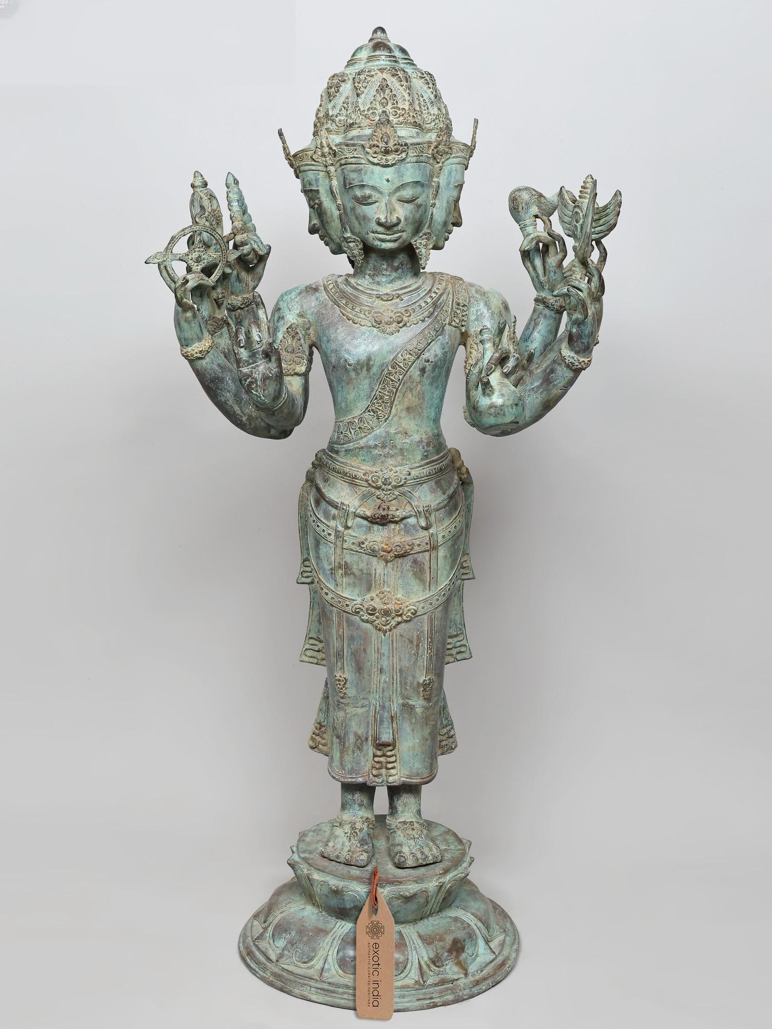 48" Large Majestic Eight-Armed Four-Faced Standing Lord Brahma | Brass Statue: The Creator of the Cosmos: A Majestic Depiction This magnificent brass statue captures the essence of Lord Brahma, the Hindu deity revered as the creator of the universe. Standing tall and majestic, t