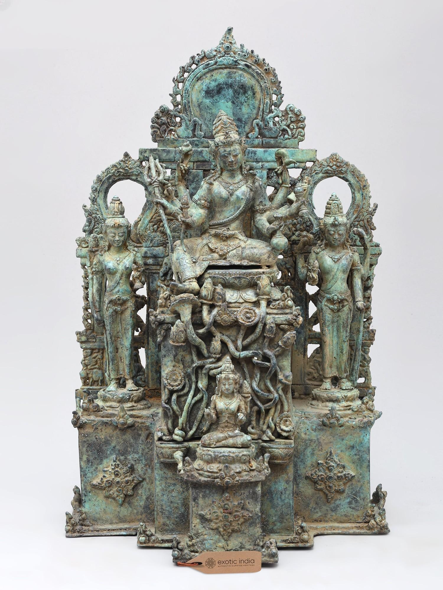 15" Universe of Goddess Tara | Brass Statue: The Embodiment of Compassion: A Reverential Depiction of Tara This magnificent brass statue captures the essence of Goddess Tara, a revered figure in Mahayana Buddhism, symbolizing wisdom,