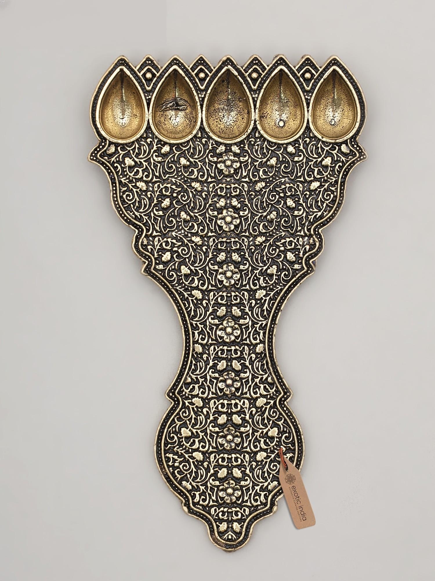 5" Small Superfine Panchamukhi Brass Spoon for Aarti | Handmade Item | Made in India: The Sacred Glow of Five Faces This exquisite brass creation is more than just a devotional object; it is a miniature testament to the rich tapestry of Indian ritual and artistry. Designed to hold