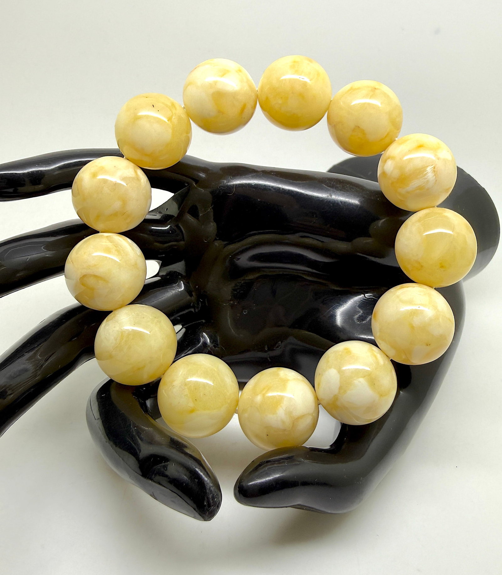 Staggering Amber Bracelet: Title:Staggering Amber Bracelet Metal:None Gemstone:Reconstituted Amber Weight:42.2 g Size:17mm Made of:(Reconstituted Amber or Whole Stone):Reconstituted Amber Additional information:Amber does not c