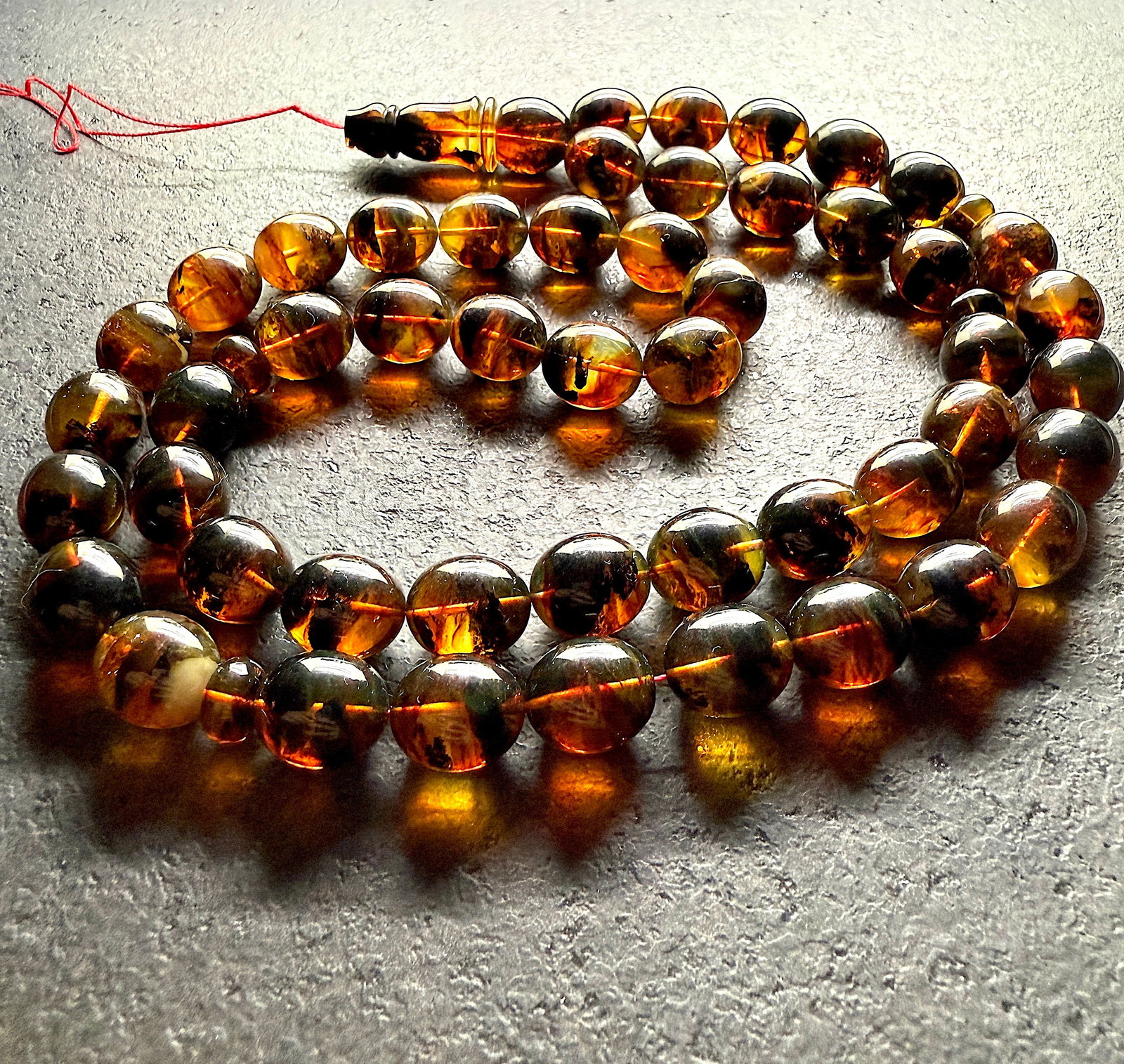 Magnificent Amber Tesbih made from Olive shaped Amber beads: Title:Magnificent Amber Tesbih made from Olive shaped Amber beads Metal:None Gemstone:Amber Weight:71.2 g Size:Bead size: 19.0 x 13.0 mm Bead size: 0.748 x 0.512 inches Made of:(Reconstituted Amber