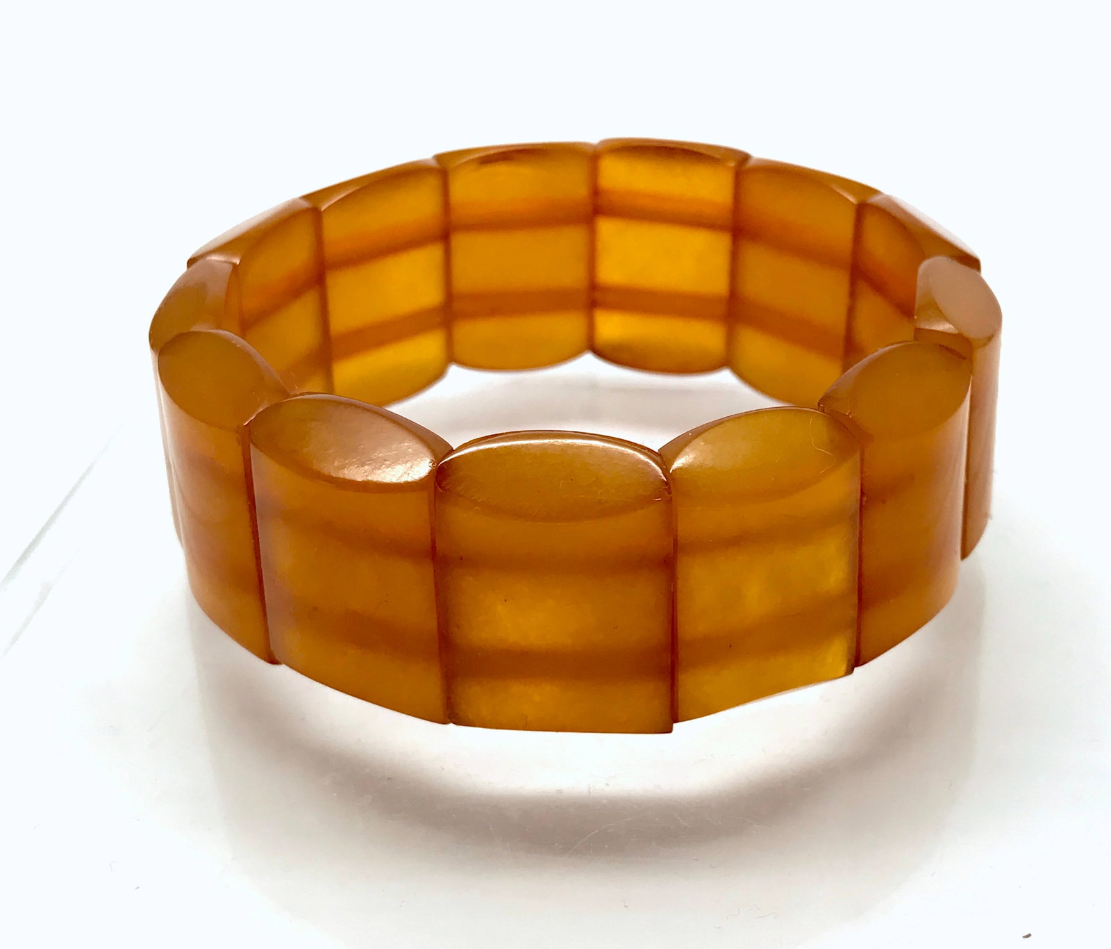 Exquisite Vintage Amber Bracelet made from Plate like Amber beads: Title:Exquisite Vintage Amber Bracelet made from Plate like Amber beads Metal:None Gemstone:Amber Weight:29.2 g Size:Bead size: 25.0 x 17.0 mm Bead size: 0.984 x 0.669 inches Made of:(Reconstituted