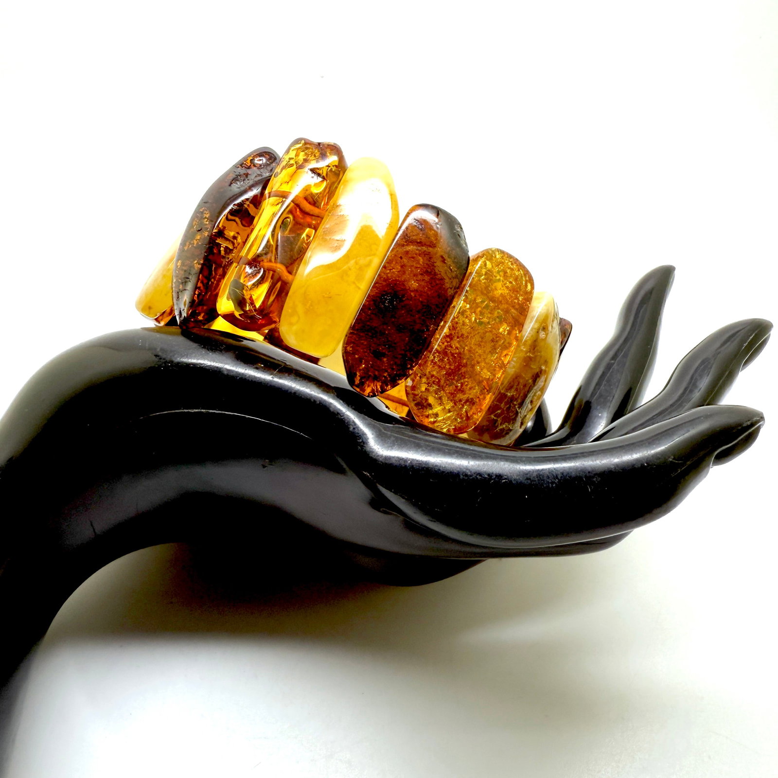 Phenomenal Amber Cuff Bracelet: Title:Phenomenal Amber Cuff Bracelet Metal:None Gemstone:Whole Stone Weight:33.5 g Size:70x 35mm Made of:(Reconstituted Amber or Whole Stone):Natural Amber Additional information:Amber does not contai