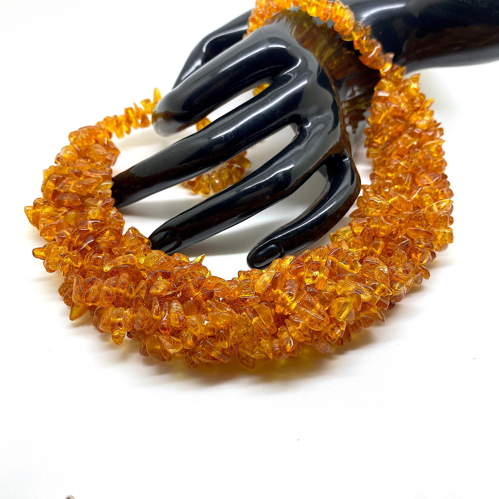 Incredible Amber Cleopatra necklace: Title:Incredible Amber Cleopatra necklace Metal:None Gemstone:Amber Weight:61.16 g Size:Size: 540.0 x 27.0 x 15.0 mm Size: 21.26 x 1.063 x 0.591 inches Made of:(Reconstituted Amber or Whole