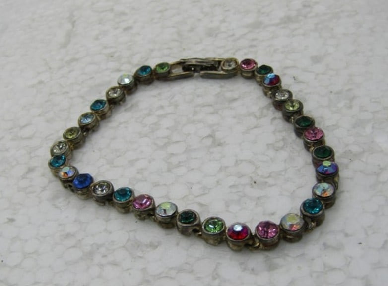 Vintage Colorful Rhinestone Tennis Bracelet, 7.5", Aurora Borealis: Title: Vintage Colorful Rhinestone Tennis Bracelet, 7.5", Aurora BorealisDescription: Vintage Colorful Rhinestone Tennis Bracelet, 7.5", Aurora Boreali, round stones set in round bezels, in clear pink