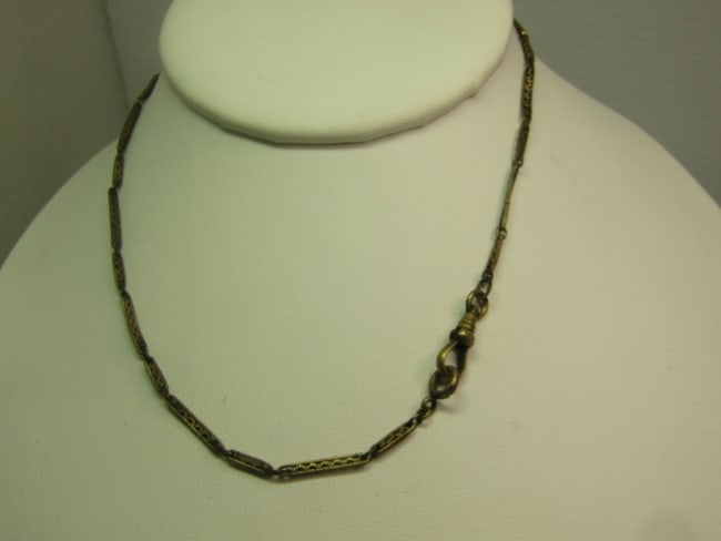 Antique 14kt G.F. Filigree Link Watch Chain, 14" 1800's-1910's, Signed: Antique 14kt G.F. Filigree Link Watch Chain, 14" 1800's-1910's, Signed with what looks like a K or an X followed by 14kt filled on the swivel. The links are appx. 1/3" and 5/8" long, alternating. This