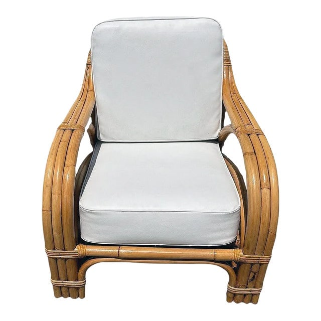 1950s Restored Mid-Century Rattan 3 Strand Transitional Lounge Chair: Title: 1950s Restored Mid-Century Rattan 3 Strand Transitional Lounge Chair Description: The Restored Rattan 3 Strand Transition Lounge Chair features a sleek, mid-century design with a handwoven