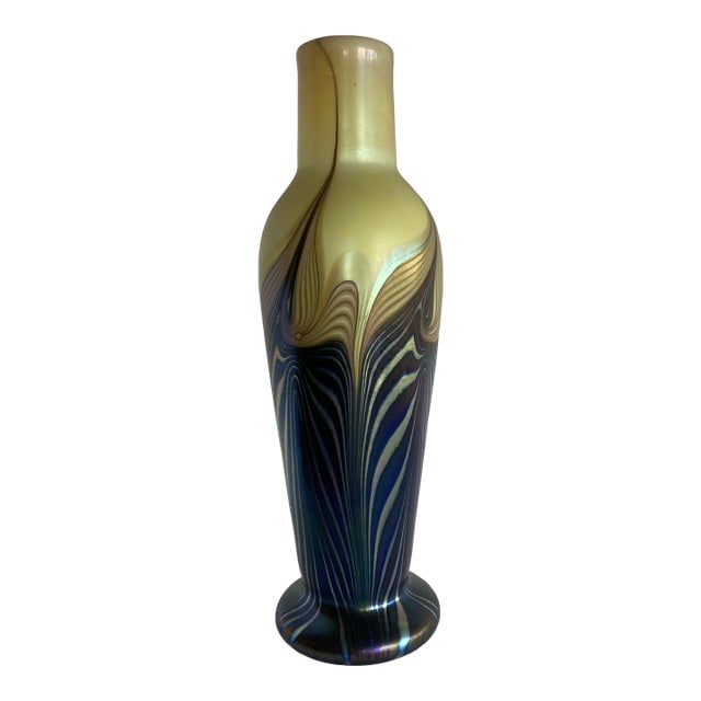 Iridescent 7 Color Art Glass Vase by Lundberg Studio: Title: Iridescent 7 Color Art Glass Vase by Lundberg Studio Description: Iridescent 7 color art glass vase flower vase with a varied ripple pattern. Signed: "Lundberg Studio 1980" Reserve: $322.20