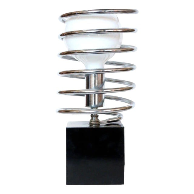 1960s Modernist Spring Table Lamp by Sonneman Lighting Company, Unsigned: Title: 1960s Modernist Spring Table Lamp by Sonneman Lighting Company, Unsigned Description: This Modernist spring table lamp features a black steel cube with a chrome socket surrounded by a large chr