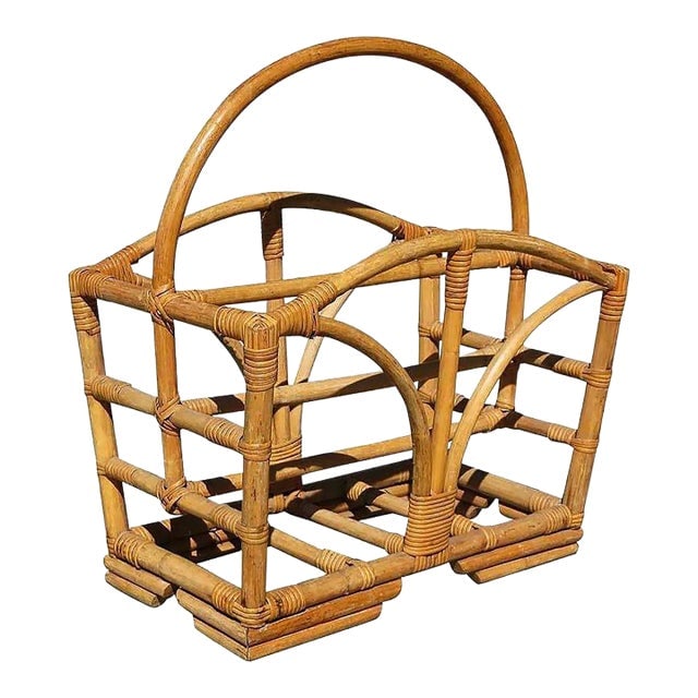 Restored Rattan Magazine Rack With Stacked Base: Title: Restored Rattan Magazine Rack With Stacked Base Description: Pole rattan magazine rack with stacked base and sprouting side decoration. 1950, United States Reserve: $174.60 Shipping: Domestic: 