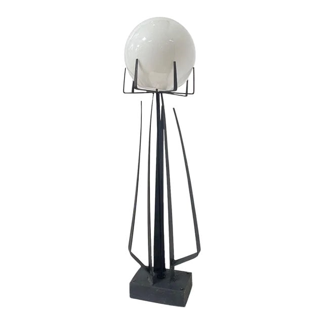 1960s Brutalist Wrought Iron Sculptural Floor Lamp With Glass Shade by Jean Maylon: Title: 1960s Brutalist Wrought Iron Sculptural Floor Lamp With Glass Shade by Jean Maylon Description: Hand Made Brutalist wrought iron sculptural floor lamp featuring a futuristic spike spindle base 