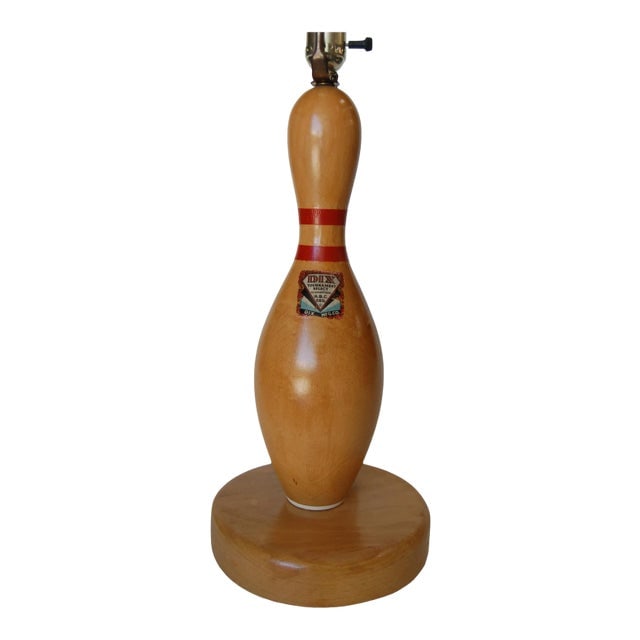 Wood DIX Tournament Select Real Bowling Pin Table Lamp: Title: Wood DIX Tournament Select Real Bowling Pin Table Lamp Description: Mid-century wood bowling pin table lamp Dix Tournament Select mounted on round wood base. Measures 9" Diameter Base x 20" Tal