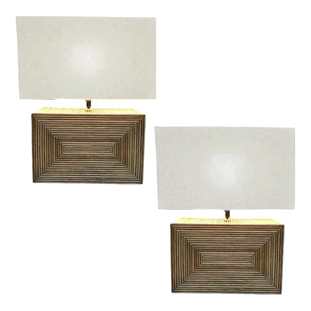 1980s Modernist Stacked Stick Rattan Vertical Brick Lamp Pair, With Shades: Title: 1980s Modernist Stacked Stick Rattan Vertical Brick Lamp Pair, With Shades Description: Pair of modernist stacked stick rattan table Brick lamps with outward fan out pattern with square white