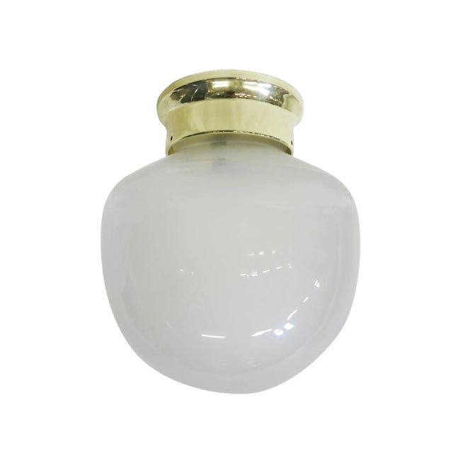 Small Vintage Gumdrop Ceiling Glass Globe Pendant: Title: Small Vintage Gumdrop Ceiling Glass Globe Pendant Description: Brighten your living space with our vintage glass globe that features a unique "gumdrop" shape. Available with a new Brass or Chro