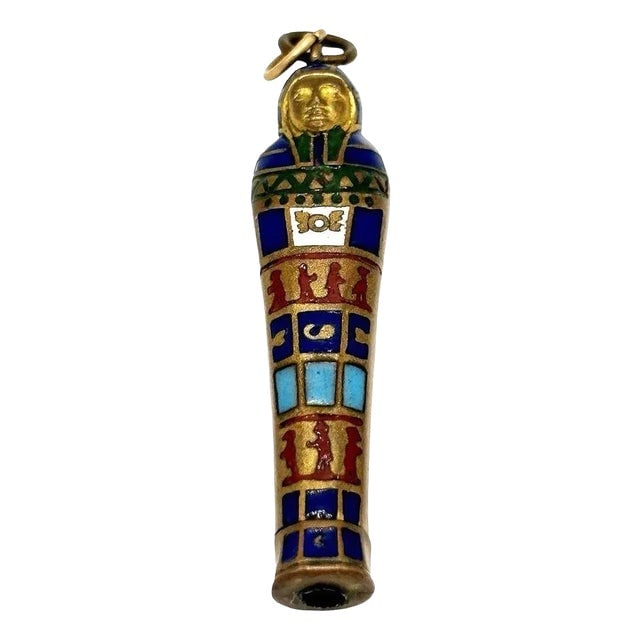 1923 Egyptian Revival Pharaoh Sarcophagus Gilt & Enamel Retractable Pencil Pendant: Title: 1923 Egyptian Revival Pharaoh Sarcophagus Gilt & Enamel Retractable Pencil Pendant Description: This vintage Egyptian revival retractable gilt pencil pendant features the shape of a Pharaoh's