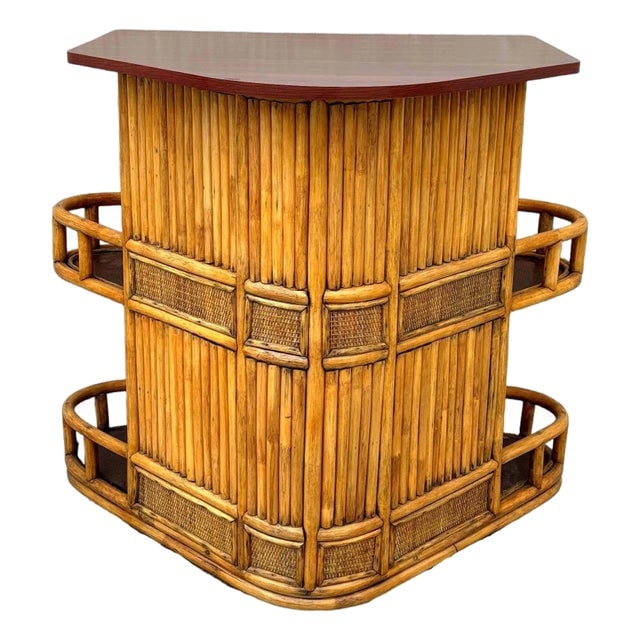 Restored Mid-Century Sailboat Ships Bow Shaped Stacked Rattan Dry Bar: Title: Restored Mid-Century Sailboat Ships Bow Shaped Stacked Rattan Dry Bar Description: Restored dry bar showcases a distinctive stacked rattan design fashioned after the bow of a sailboat. The bar 