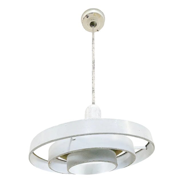 Mid-Century "Saturn" Ceiling Steel 20" Hooded Pendant by Kurt Versen: Title: Mid-Century "Saturn" Ceiling Steel 20" Hooded Pendant by Kurt Versen Description: Kurt Versen designed "Saturn" ceiling light featuring a stacked steel ring light shade with a hood suspended by