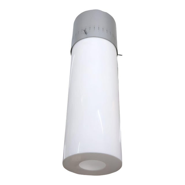 1958 Mid-Century Modern Cylinder Acrylic & Steel Pendant, 2 Available: Title: 1958 Mid-Century Modern Cylinder Acrylic & Steel Pendant, 2 Available Description: A unique 1958 Mid-century hanging lamp showcasing a vented aluminum cap and a white Lucite cylinder shade.