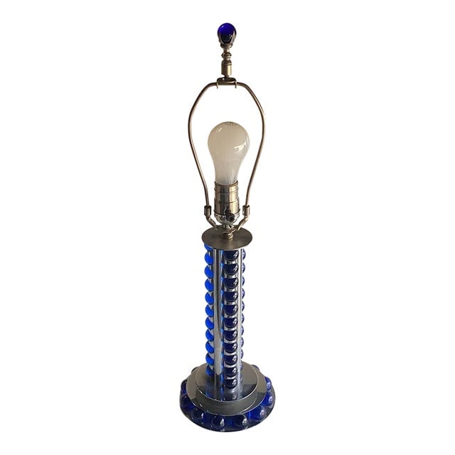 1930s Chromed Steel and Cobalt Marble Art Deco Lamp: Title: 1930s Chromed Steel and Cobalt Marble Art Deco Lamp Description: Crafted around 1930, the chromed steel and cobalt marble machine age art deco lamp is a striking blend of sleek design and indus