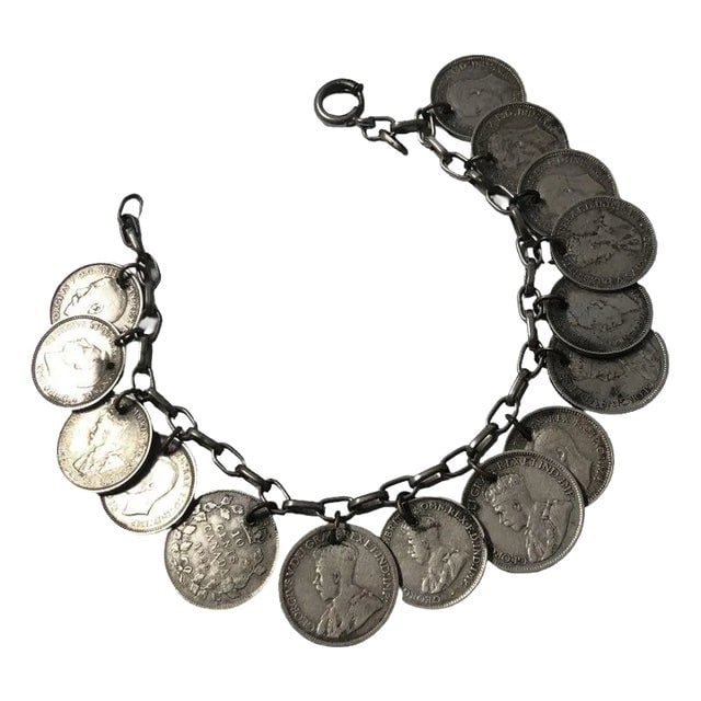 Wwii Era Canadian, English & Australian Solid Silver Coin Charm Bracelet: Title: Wwii Era Canadian, English & Australian Solid Silver Coin Charm Bracelet Description: Handmade WWII era silver coin bracelet featuring 15 silver coins (3 pence to 10-cent coins) from Canada, Au