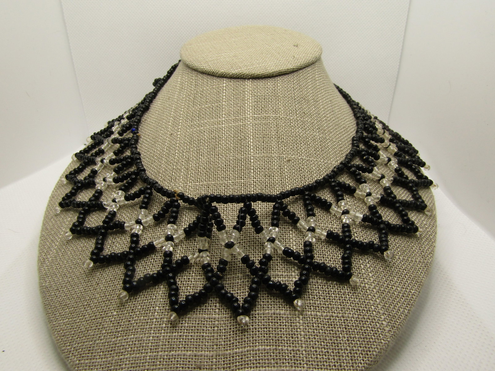Vintage Black & Clear Seed Beaded Collar Necklace, 20" Pointed Drop Design: Title: Vintage Black & Clear Seed Beaded Collar Necklace, 20" Pointed Drop Design Description: Vintage Black & Clear Seed Beaded Collar Necklace, 20" Pointed Drop Design that is 1.5" drop that goes al