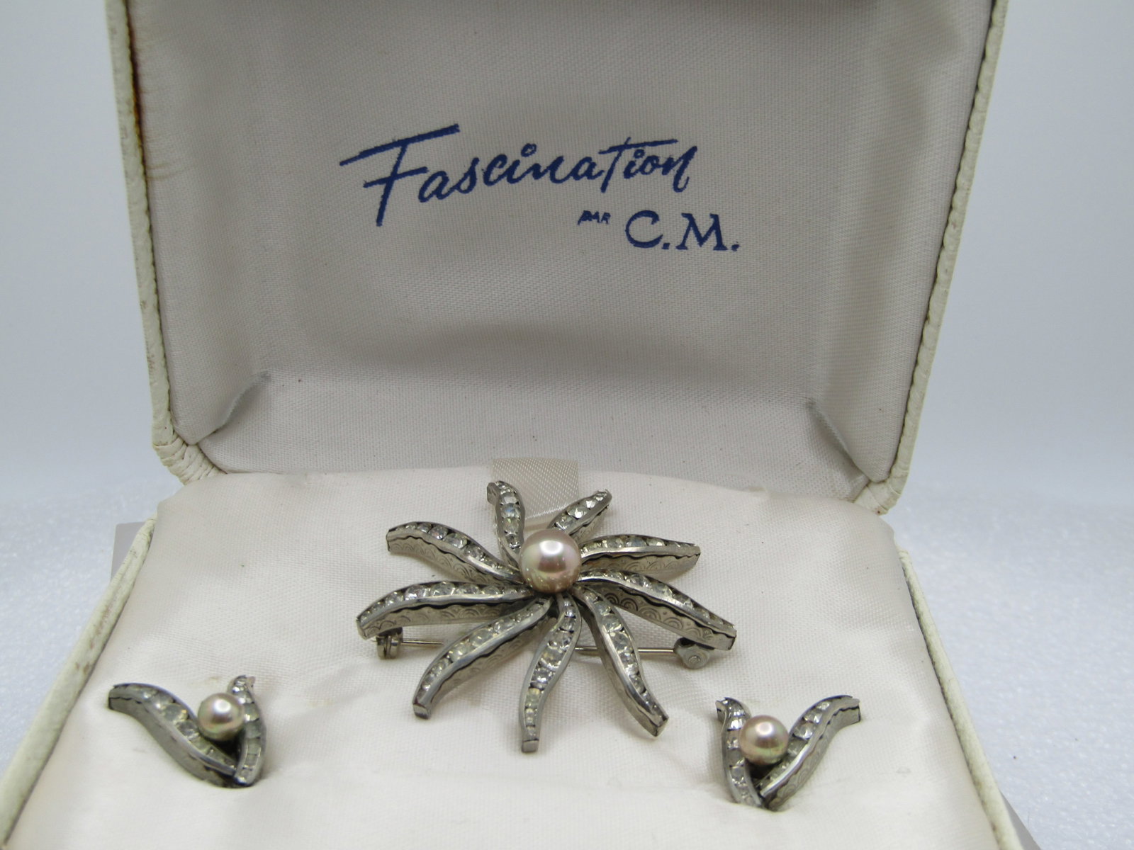 Vintage Rhinestone Brooch & Earrings Set, Fascination par C.M. Appx. 1950's-1960's.: Title: Vintage Rhinestone Brooch & Earrings Set, Fascination par C.M. Appx. 1950's-1960's. Description: Vintage Rhinestone Brooch & Earrings Set, estimated mid-century. Fascination par