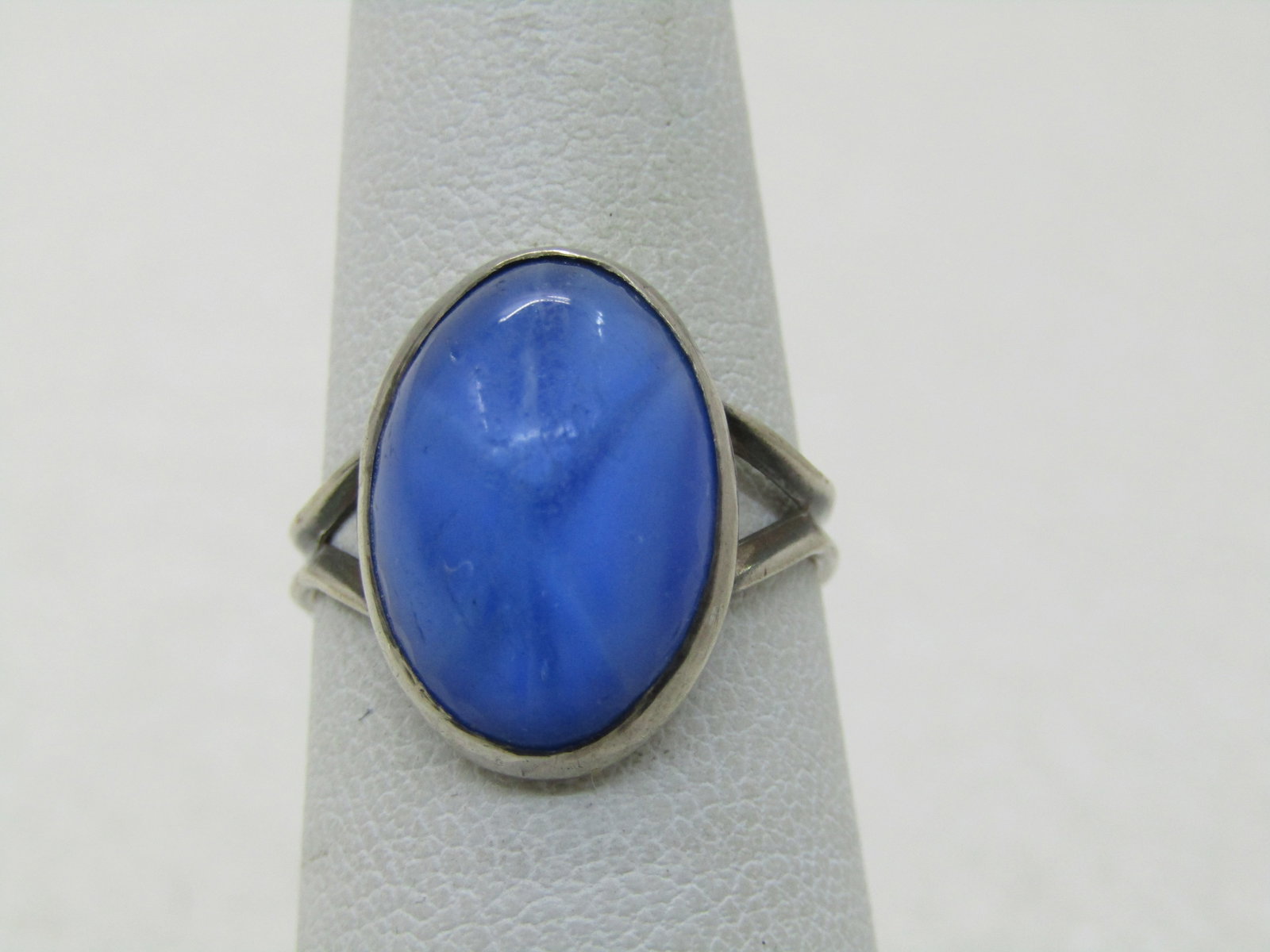 Vintage Sterling Blue Glass Ring, Sz. 6, 1950's-1960's: Title: Vintage Sterling Blue Glass Ring, Sz. 6, 1950's-1960's Description: Vintage Sterling Blue Glass Ring, Sz. 6, 1950's-1960's. Oval blue glass tone with the look of a star sapphire (ish). Bezel-se