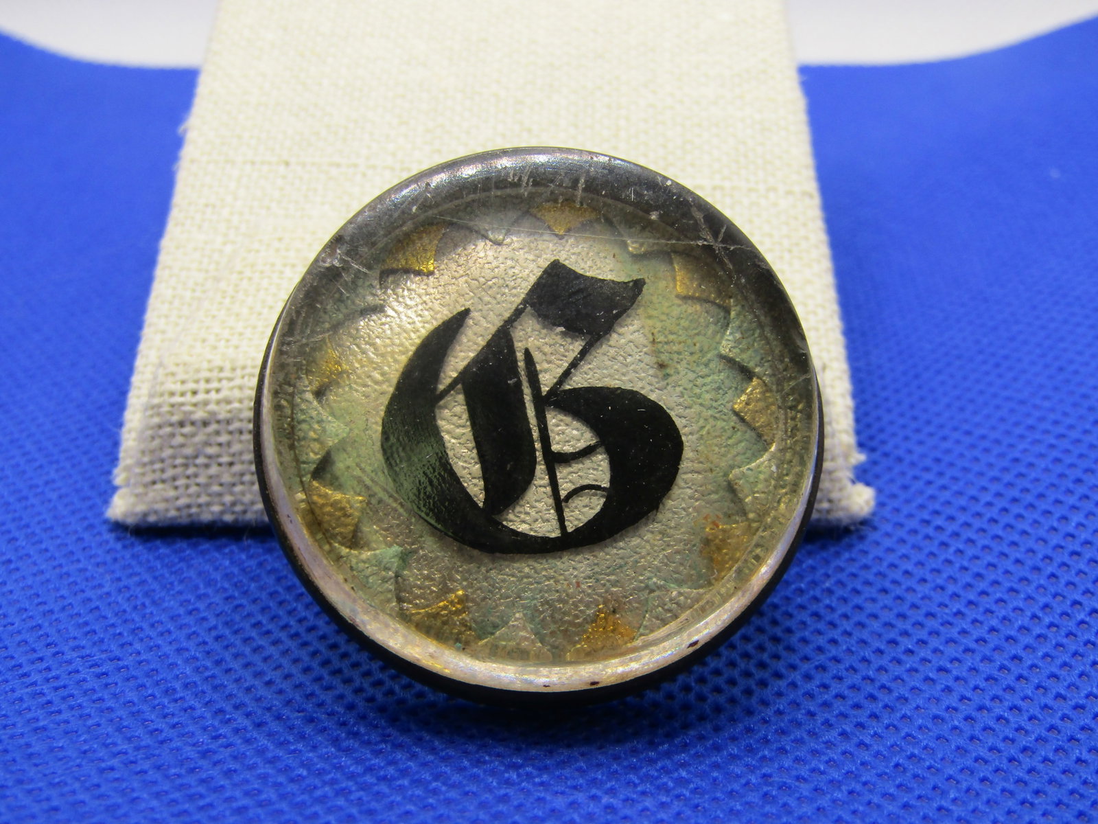 Vintage Initial B Glass Bridle Button, 1930's: Title: Vintage Initial B Glass Bridle Button, 1930's Description: Vintage Initial B Glass Bridle Button, 1930's, 1.5" round black enamel B with a metal base and slide for the bridle to slip through. C