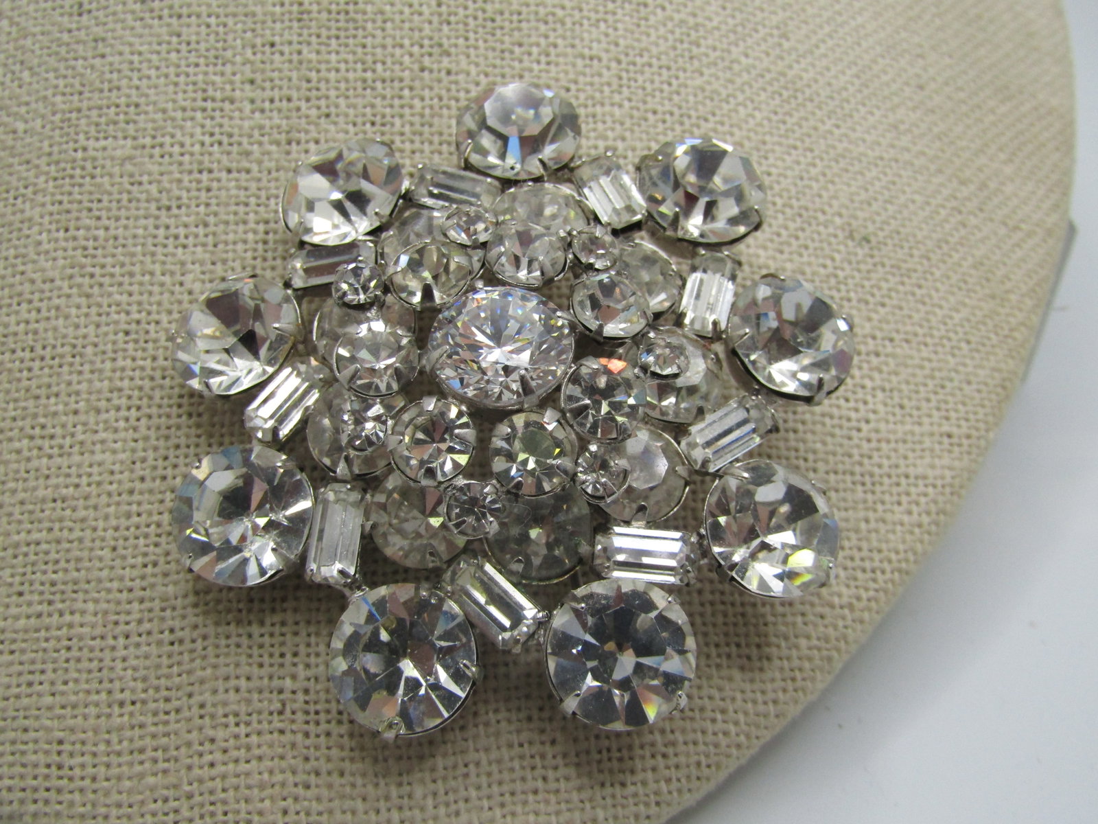 Vintage Clear Rhinestone Tiered Blosson Brooch, 2.25". Mid-Century: Title: Vintage Clear Rhinestone Tiered Blosson Brooch, 2.25". Mid-Century Description: Vintage Clear Rhinestone Tiered Blosson Brooch, 2.25". Mid-Century. Silver tone. Mixed sizes of round clear rhine