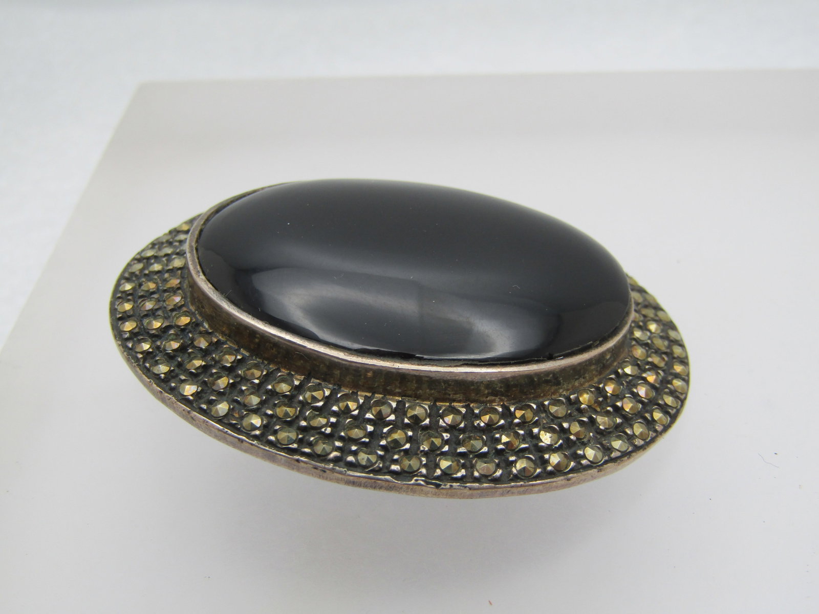 Vintage Sterling Black Marcasite Brooch, Signed V, 2" by 1.75": Title: Vintage Sterling Black Marcasite Brooch, Signed V, 2" by 1.75" Description: Vintage Sterling Black Marcasite Brooch, Signed V, 2" by 1.75", It is signed with a V, marked sterling and Thailand. 