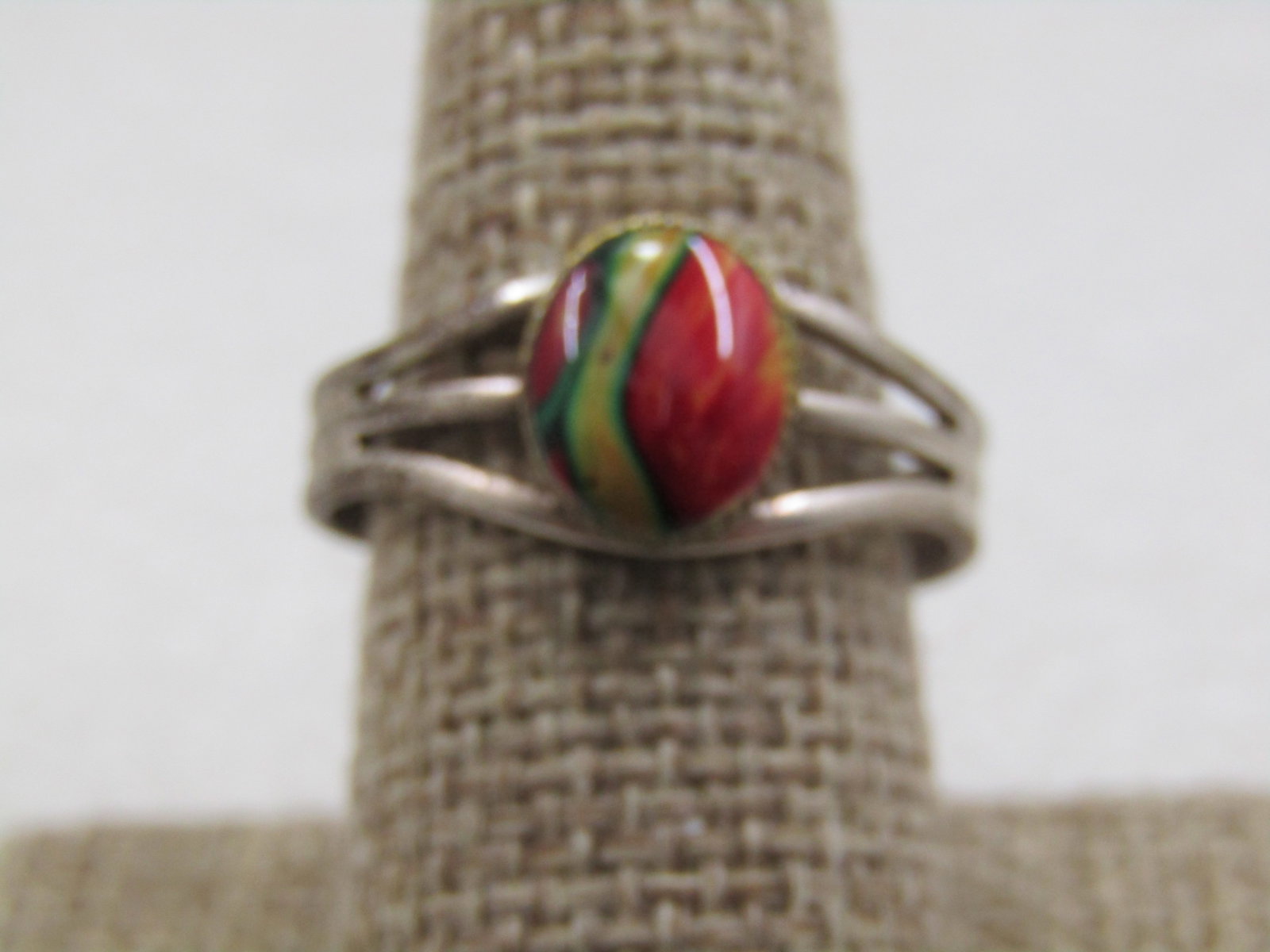 Vintage Silver Tone Red Glass Stone Ring, Adj. 6-8: Title: Vintage Silver Tone Red Glass Stone Ring, Adj. 6-8 Description: Vintage Silver Tone Red Glass Stone Ring, Adj. 6-8. AN oval bezel-set glass stone mostly red with yellow and green. It has a