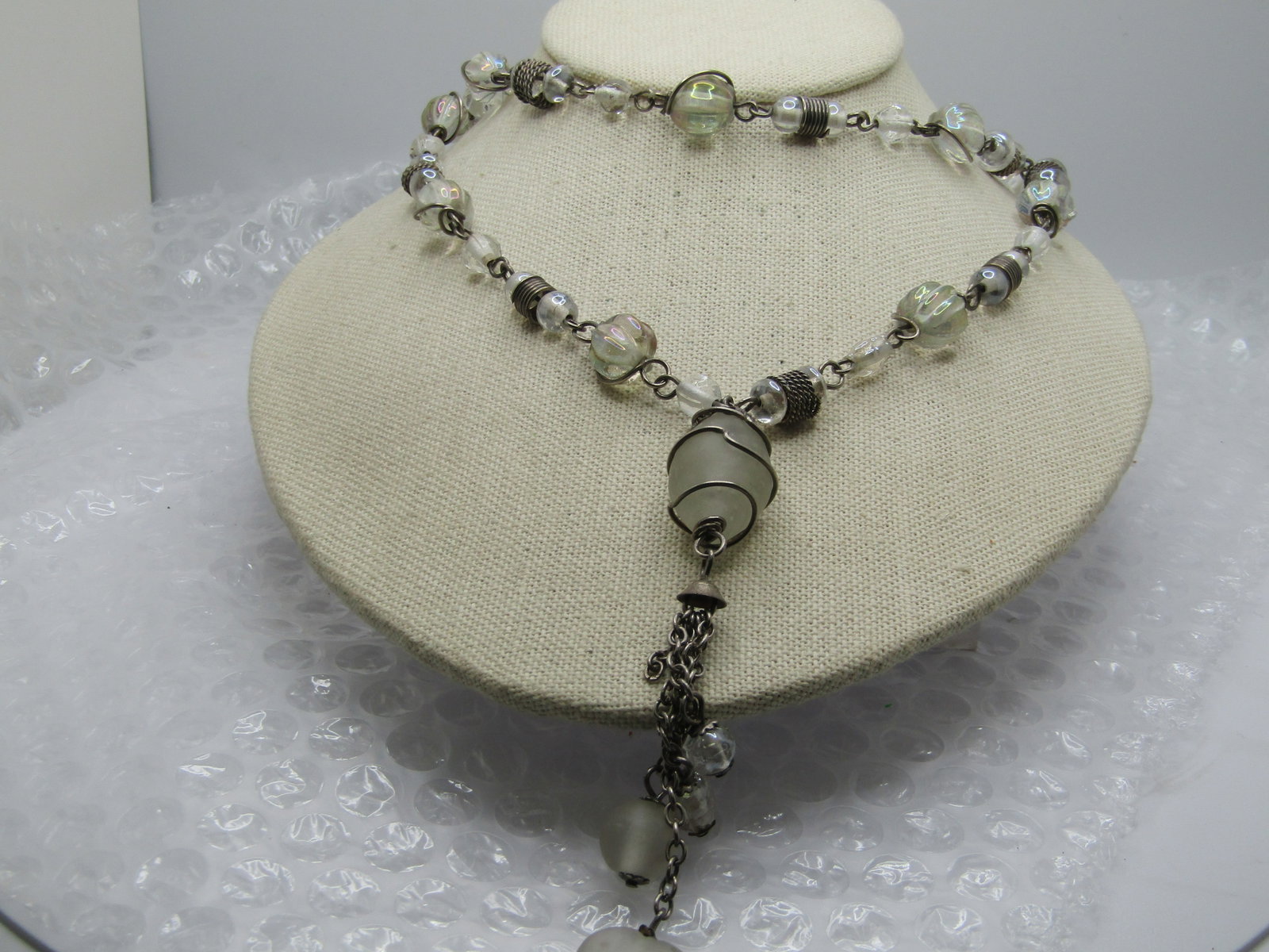 Vintage Clear & Frosted Glass Tassel necklace, 35" Plus Tassel, 1970's-1980's: Title: Vintage Clear & Frosted Glass Tassel necklace, 35" Plus Tassel, 1970's-1980's Description: Vintage Clear & Frosted Glass Tassel necklace, 35" Plus Tassel, 1970's-1980's. Boho. The beads are wra