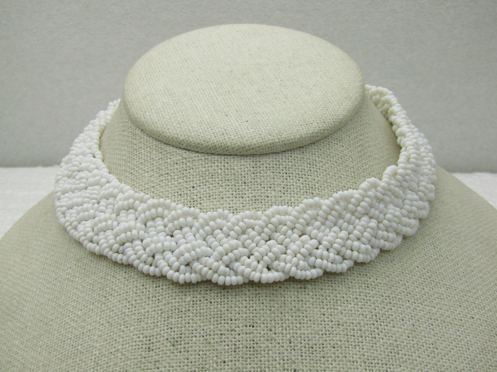 Vintage White Beaded Woven Choker Necklace, 14.5", 1930's-1940's: Title: Vintage White Beaded Woven Choker Necklace, 14.5", 1930's-1940's Description: Vintage White Beaded Woven Choker Necklace, 14.5", 1930's-1940's, 1" wide with hook clasp and gold tone end caps an