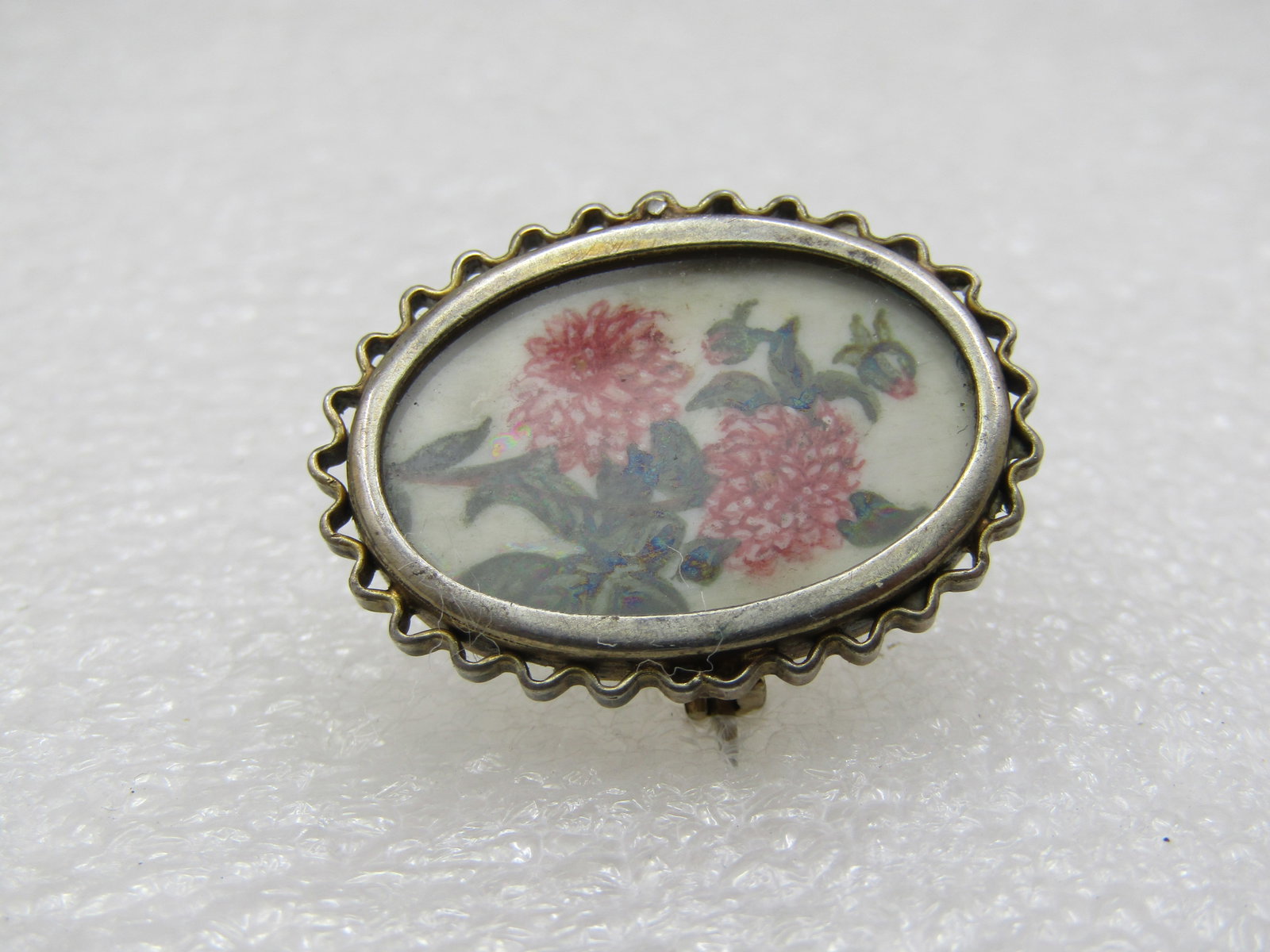 Vintage .800 SIlver Pink Dahlia Brooch, Signed: Title: Vintage .800 SIlver Pink Dahlia Brooch, Signed Description: Vintage .800 SIlver Pink Dahlia Brooch, Signed, 1" by 3/4" oval with a painted double dahlia and leaves on white background - could b