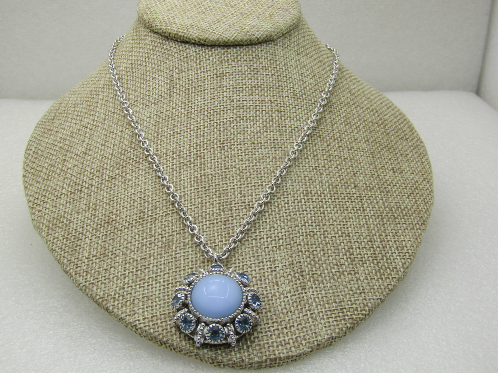 Blue Rhinestone & Glass Necklace, 24", Silver Tone: Title: Blue Rhinestone & Glass Necklace, 24", Silver Tone Description: Blue Rhinestone & Glass Necklace, 24", Silver Tone - round with a center milky blue glass stone and then a halo of blue rhineston