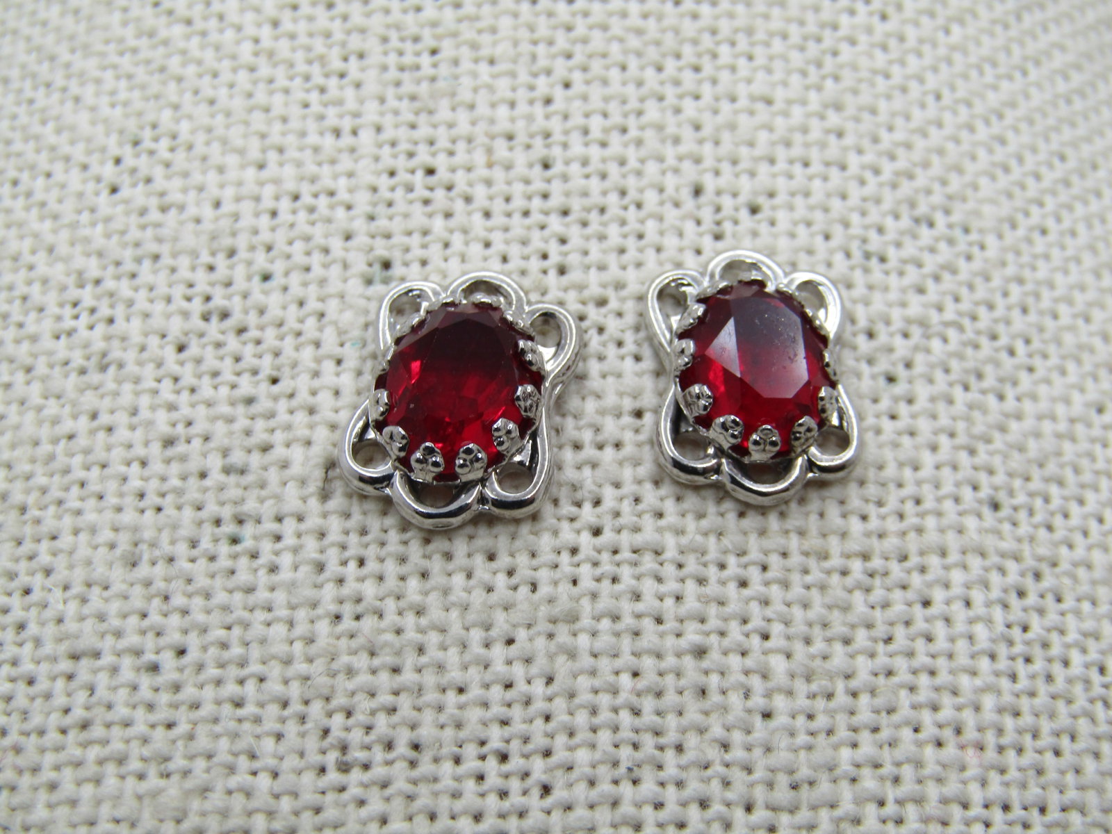 Vintage Sterling Red Stone Stud Earrings, 1980's-1990's: Title: Vintage Sterling Red Stone Stud Earrings, 1980's-1990's Description: Vintage Sterling Red Stone Stud Earrings, 1980's-1990's. They have a deep red stone that is papx. 8mm tall and 5mm wide, ova