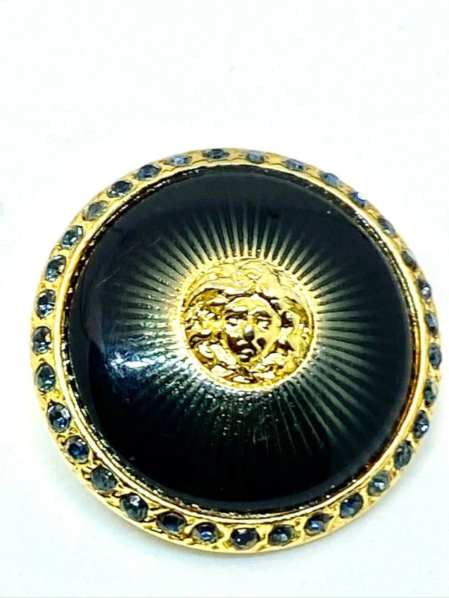 Versace Vintage Medusa Head Shank Button with Green color lacquer forming rays: Title:Versace Vintage Medusa Head Shank Button with Green color lacquer forming rays Description:Versace Vintage Medusa Head Shank Button with dark Green color lacquer forming rays These amazing