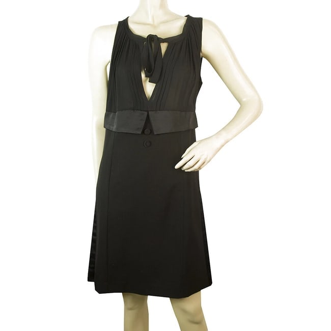 Twin Set Simona Barbieri Black Sleeveless V Neckline w. Bow Mini Dress: Title:Twin Set Simona Barbieri Black Sleeveless V Neckline w. Bow Mini Dress Description:Twin Set Simona Barbieri Black Sleeveless V Neckline w. Bow Mini Dress A black dress by Simona Barbieri to