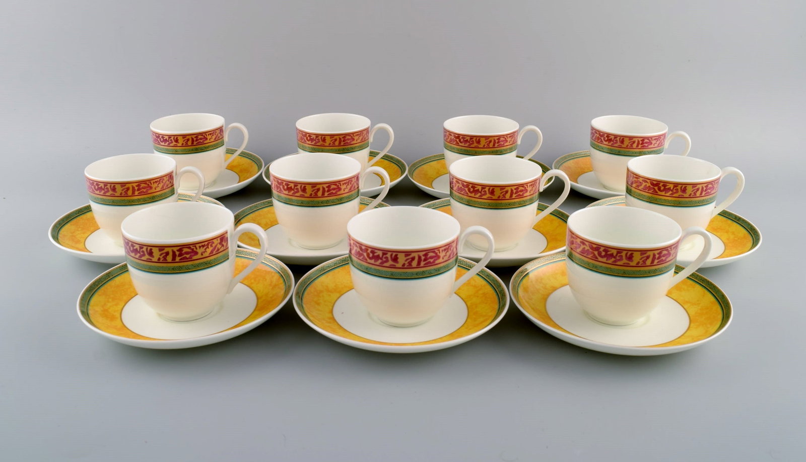Paloma Picasso for Villeroy & Boch. 11 "My way" porcelain coffee cups with saucers. Colorful: Title: Paloma Picasso for Villeroy & Boch. 11 "My way" porcelain coffee cups with saucers. Colorful decoration. 1990s. Description: Paloma Picasso for Villeroy & Boch. 11 "My way" porcelain coffee cup